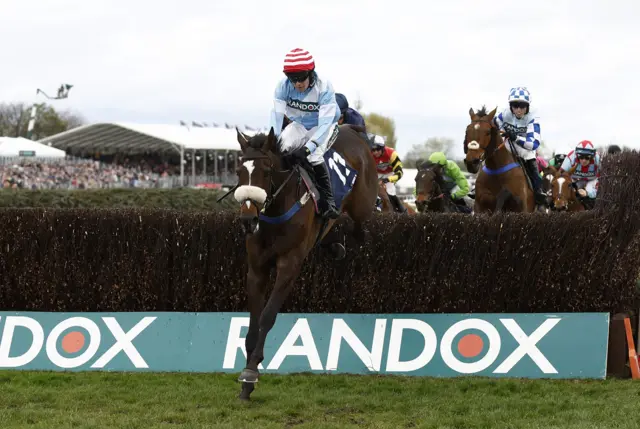 Cruz Control jumps a fence while leading the William Hill Handicap Chase