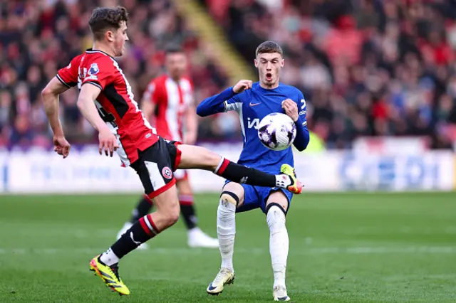 Oliver Arblaster beats Cole Palmer to the ball