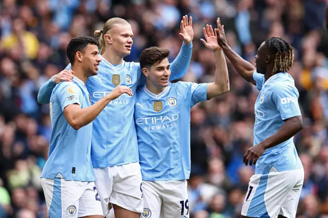 Erling Haaland celebrates with teammates