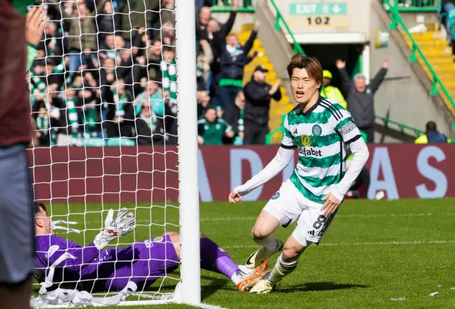 Celtic's Kyogo Furuhashi wheels away to celebrate