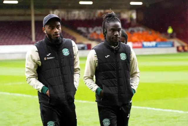 Myziane Maolida (L) and Elie Youan (R) walking on the pitch at Fir Park