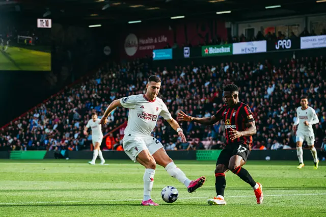 Diogo Dalot of Manchester United in action with Luis Sinisterra