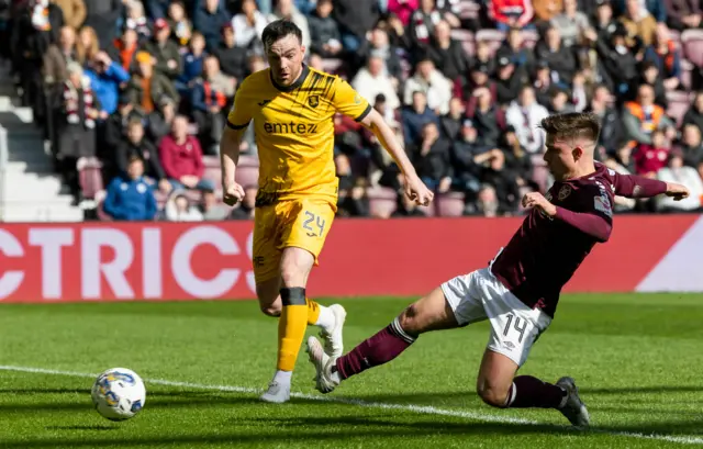 Cammy Devlin dives in to score for Hearts