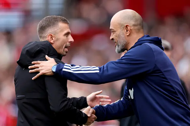 Gary O'Neil, Manager of Wolverhampton Wanderers, interacts with Nuno Espirito Santo