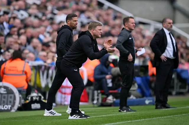 Eddie Howe applauds on the touchline