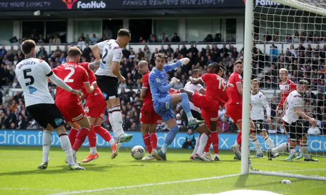 Derby County’s Kane Wilson scores against Leyton Orient