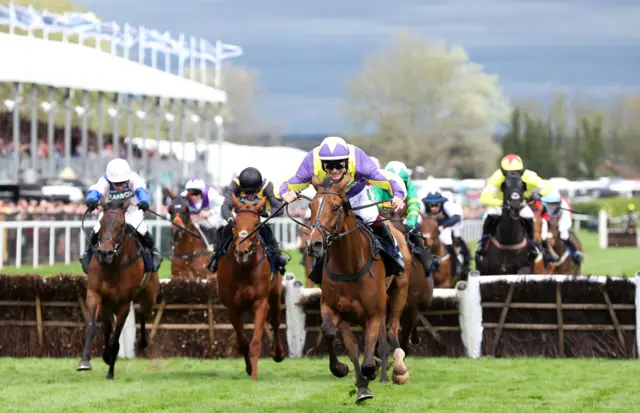 Gweenie May Boy races clear to win the William Hill Handicap Hurdle