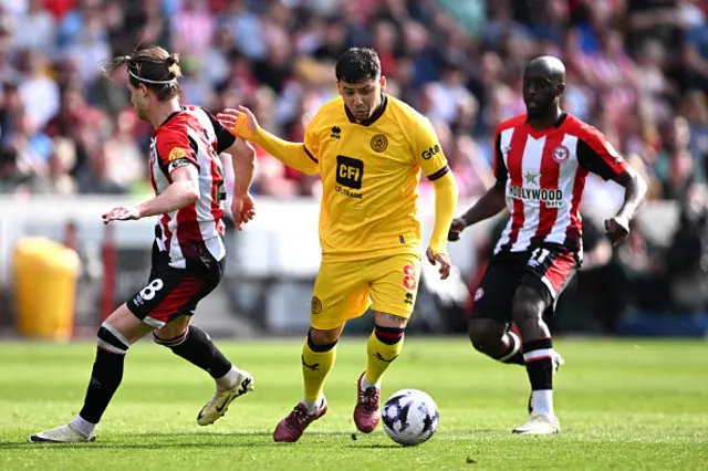 Gustavo Hamer of Sheffield United runs with the ball under pressure