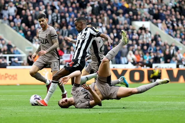 Alexander Isak scores inside the box as Micky van de Ven goes to ground