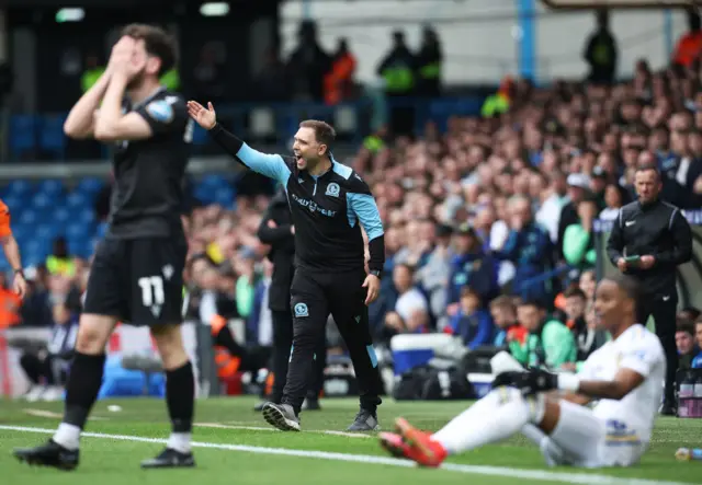 Blackburn boss John Eustace shouts instructions to his team