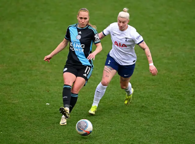 Cayman and England duel for the ball