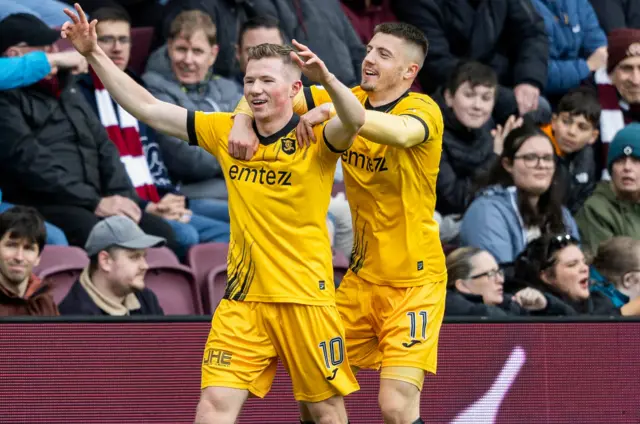 Stephen Kelly celebrates the opener at Tynecastle