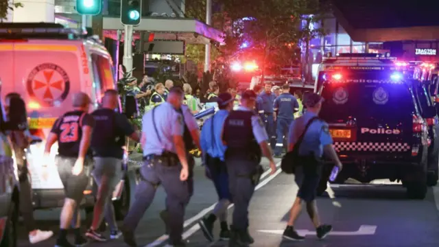 Ambulances attend to the scene of the Sydney mall stabbing