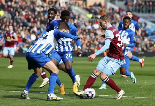 Joel Veltman (left) and Burnley's Jacob Bruun Larsen battle for the ball