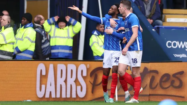 Portsmouth celebrate Abu Kamara's early goal