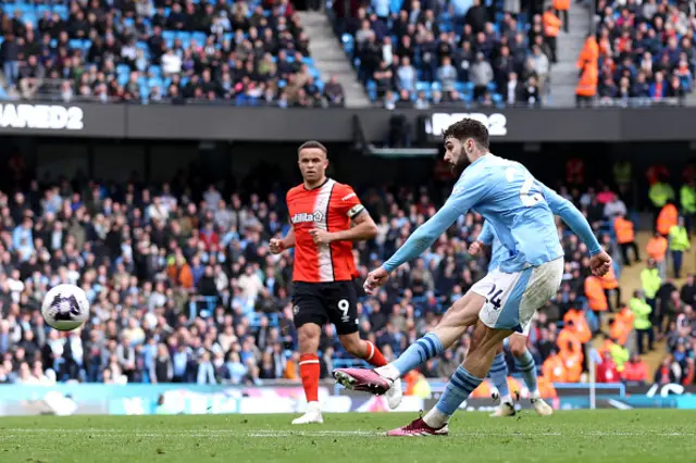 : Josko Gvardiol of Manchester City shoots from the edge of the box