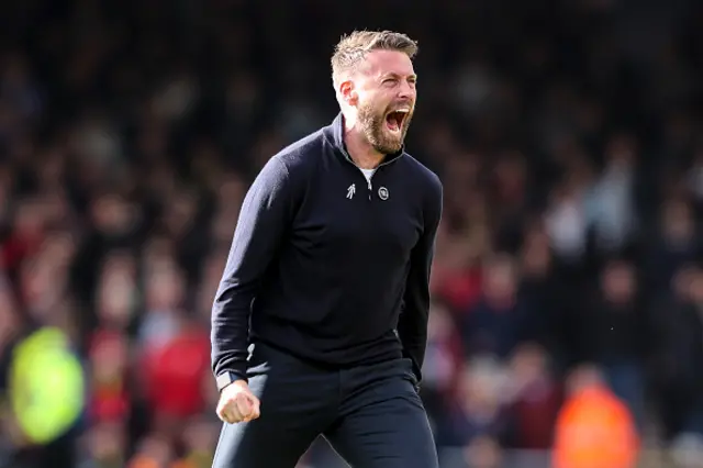 Rob Edwards celebrates