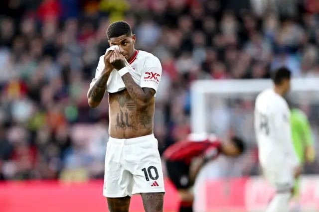 Rashford wipes sweat off his head