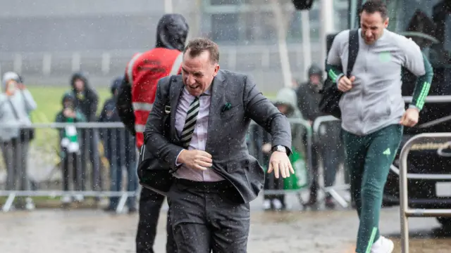 Celtic boss Brendan Rodgers gets a soaking