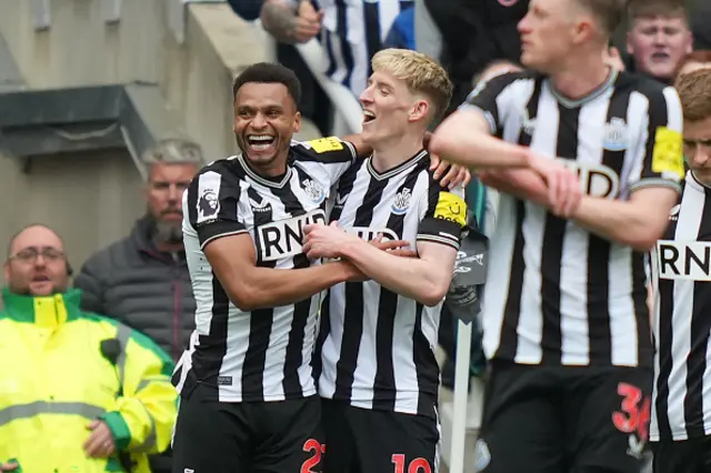 Jacob Murphy and Anthony Gordon celebrate together