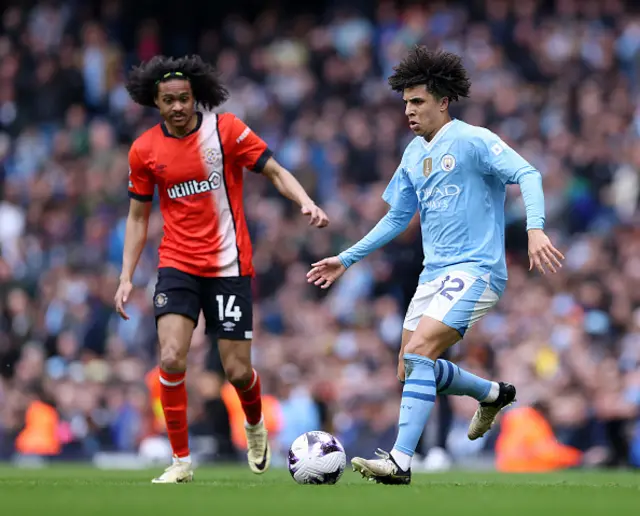 Rico Lewis on the ball for Man City