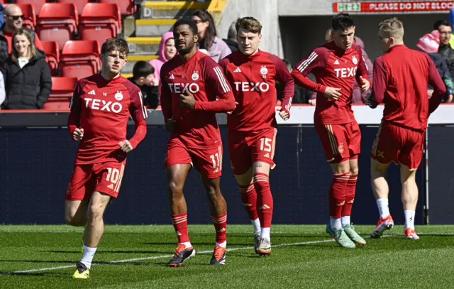 Aberdeen players warming up at Pittodrie