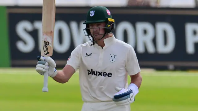 Nathan Smith celebrates scoring 50