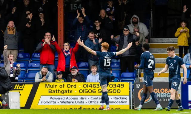 Simon Murray celebrates