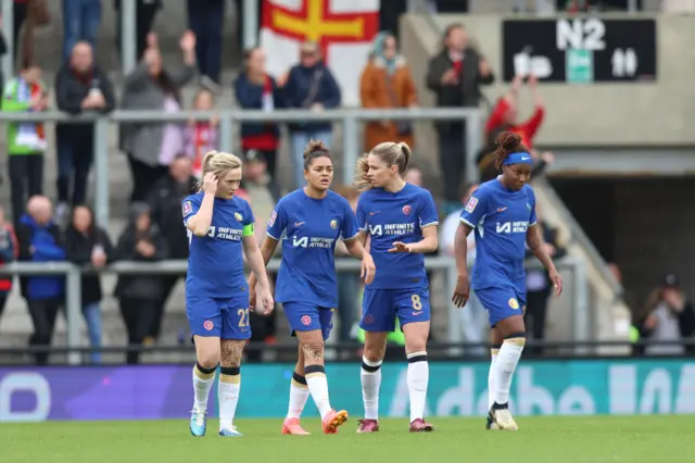 Chelsea players look dejected