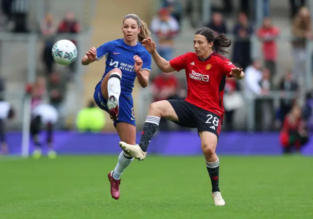 Leupolz and Williams duel for the ball