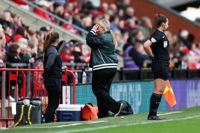 Hayes holds her head in her hands after a missed chance