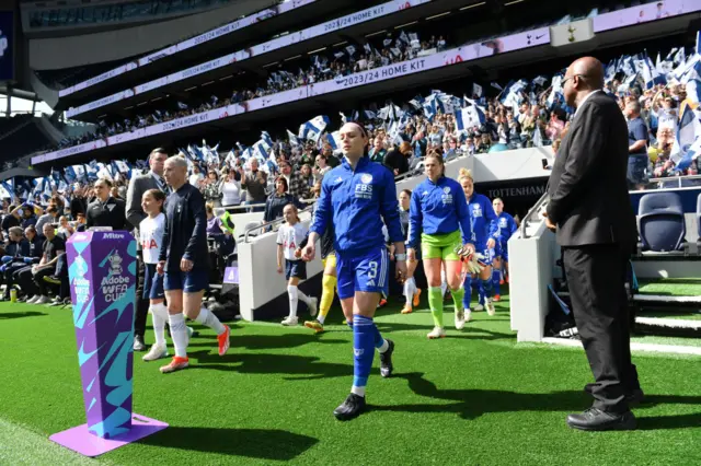 Players in tunnel