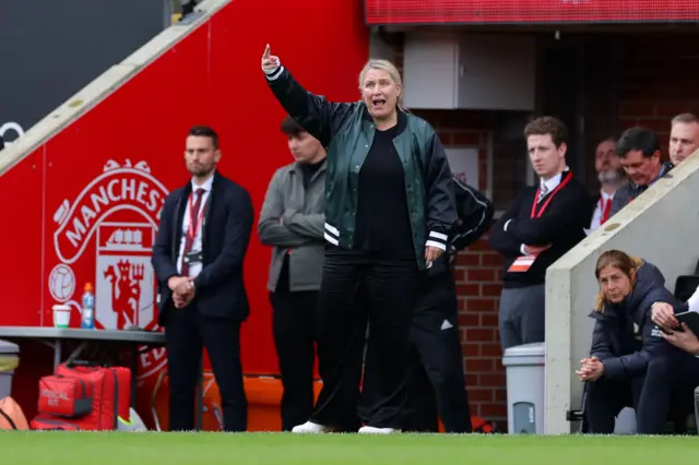 Emma Hayes points and shouts orders from the touchline.