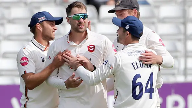 Matt Critchley celebrates taking a wicket