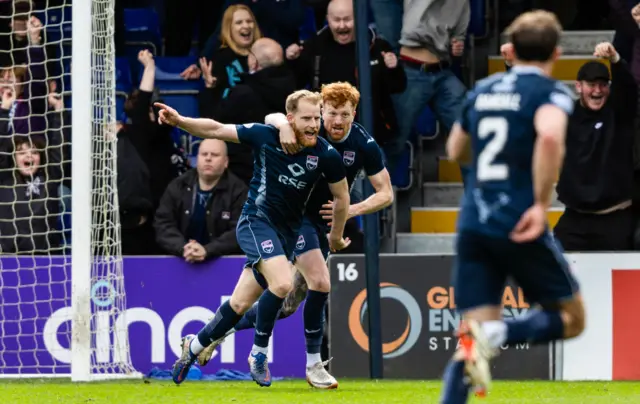 Josh Sims wheels away in celebration after scoring County's third