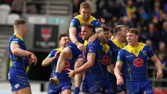 Warrington celebrate