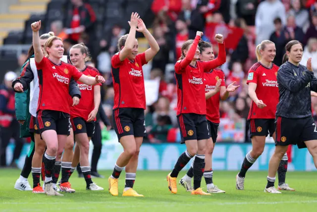 United players celebrate at full time