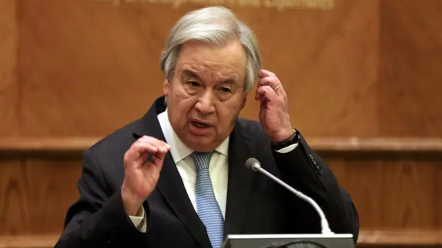 UN Secretary General Antonio Guterres speaks at a podium