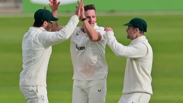 Nathan Smith celebrates taking wicket