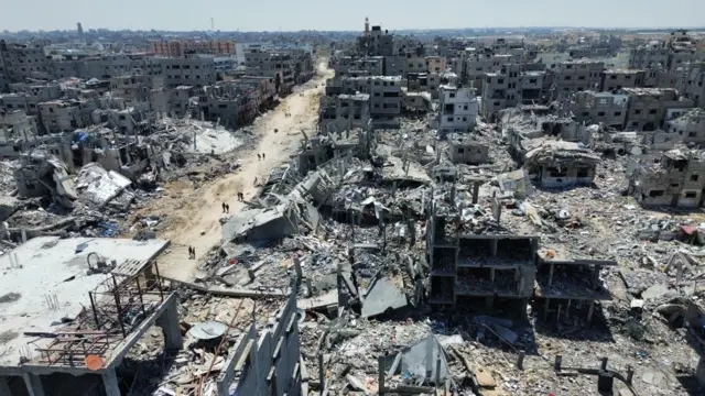 Aerial view taken with a drone showing general destruction in the city of Khan Yunis in the Gaza Strip, following the Israeli army withdrawal from the region, on 14 April 2024.