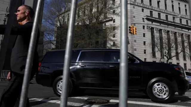 The motorcade of Republican presidential candidate and former U.S. President Donald Trump pass by outside the courthouse