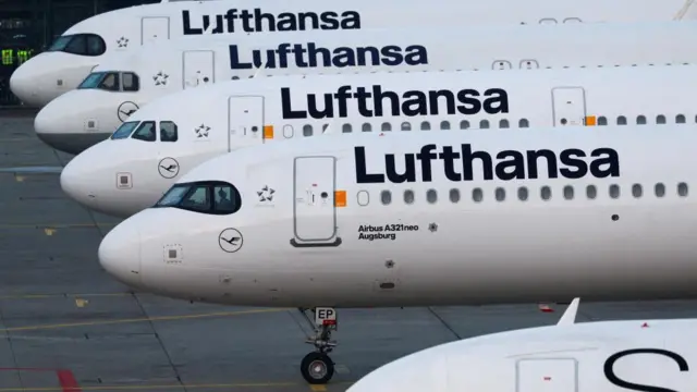 Lufthansa planes stand parked