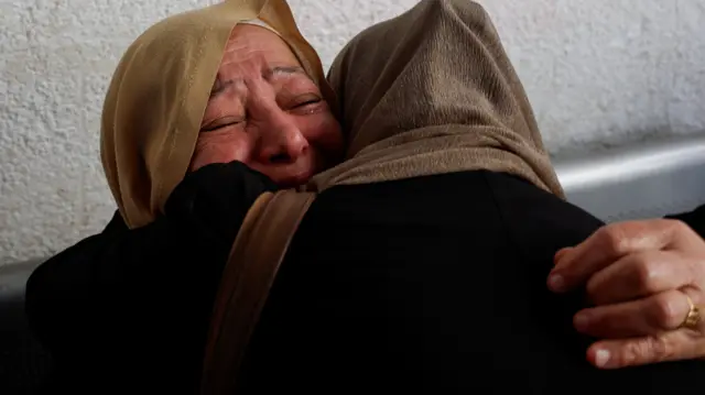 A woman cries following the death of a loved one killed in a strike Rafah