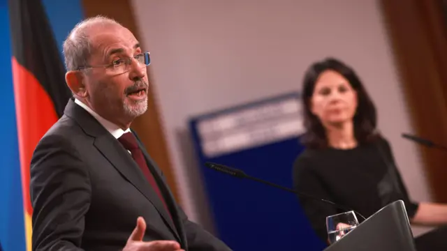 Jordanian Foreign Minister Ayman Safadi speaking next to German Foreign Minister Annalena Baerbock during a press conference in Berlin.