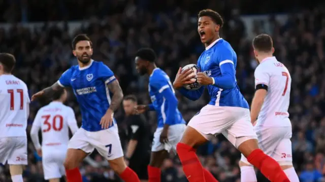 Portsmouth's Kusini Yengi celebrates his goal