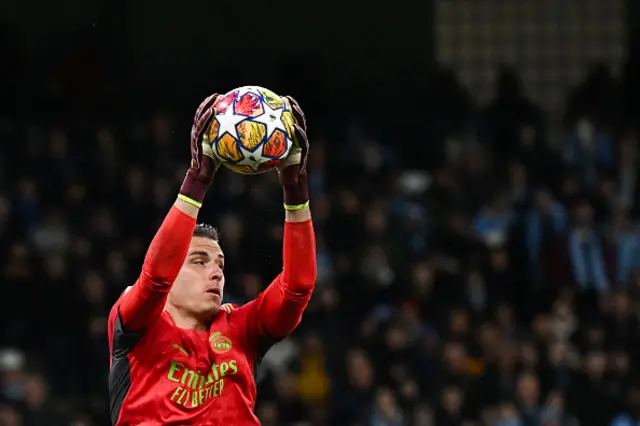 Andriy Lunin claims the ball