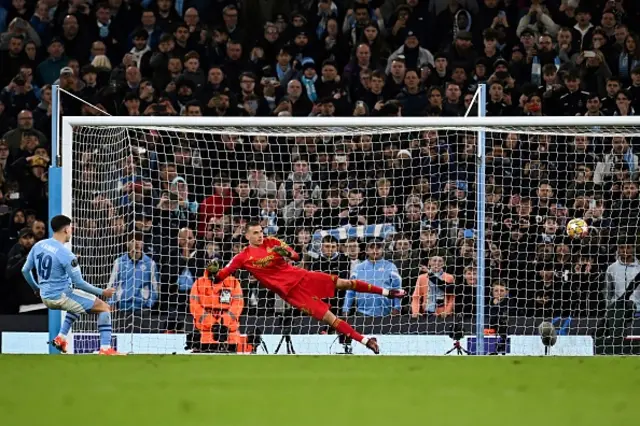 Julian Alvarez shoots from the penalty spot