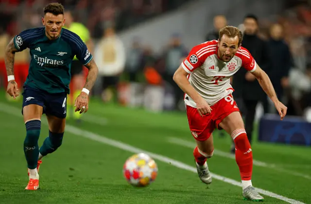 Harry Kane and Arsenal's English defender Ben White vie for the ball