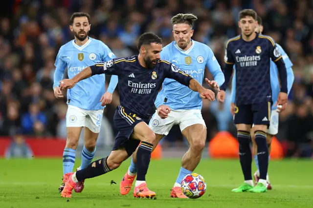 Daniel Carvajal of Real Madrid competes with Jack Grealish