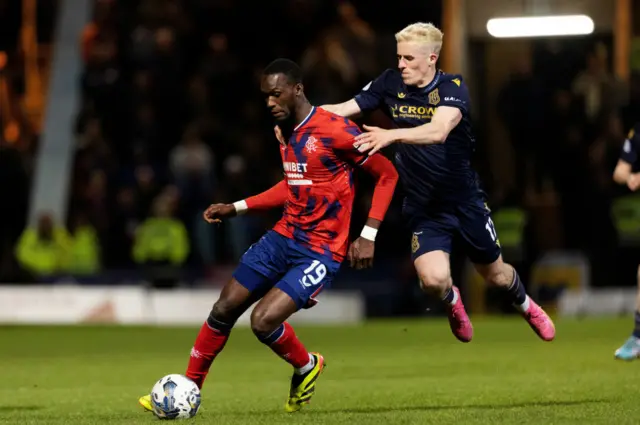 Rangers Abdallah Sima and Luke McCowan in action during a cinch Premiership match between Dundee and Rangers at the Scot Foam Stadium at Dens Park,
